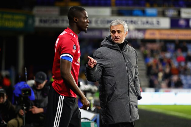 HUDDERSFIELD, ENGLAND - FEBRUARY 17: Manager of Manchester United Jose Mourinho talks with Eric Bailly of Manchester United on the sidelines during the Emirates FA Cup Fifth Round match between Huddersfield Town and Manchester United on February 17, 2018 in Huddersfield, United Kingdom.  (Photo by Chris Brunskill Ltd/Getty Images)