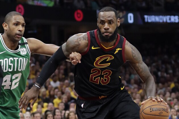 Cleveland Cavaliers' LeBron James (23) drives past Boston Celtics' Al Horford (42), from Dominican Republic, in the first half of Game 4 of the NBA basketball Eastern Conference finals, Monday, May 21, 2018, in Cleveland. (AP Photo/Tony Dejak)