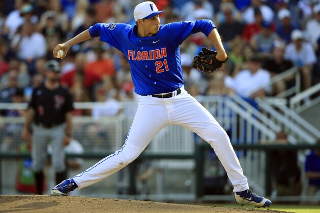 FILE - In this June 21, 2016, file photo, Florida's Alex Faedo (21) pitches against Texas Tech in the eighth inning of an NCAA men's College World Series baseball game in Omaha, Neb. The Gators have a lockdown weekend rotation with Alex Faedo, Brady Singer and Jackson Kowar. (AP Photo/Nati Harnik, File)