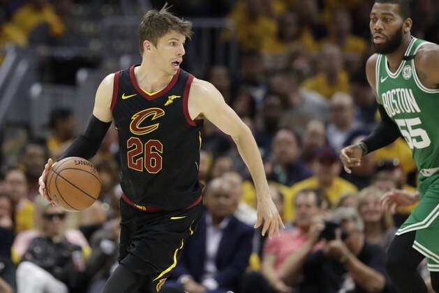 Cleveland Cavaliers' Kyle Korver (26) looks past Boston Celtics' Greg Monroe (55) in the second half of Game 3 of the NBA basketball Eastern Conference finals, Saturday, May 19, 2018, in Cleveland. The Cavaliers won 116-86. (AP Photo/Tony Dejak)