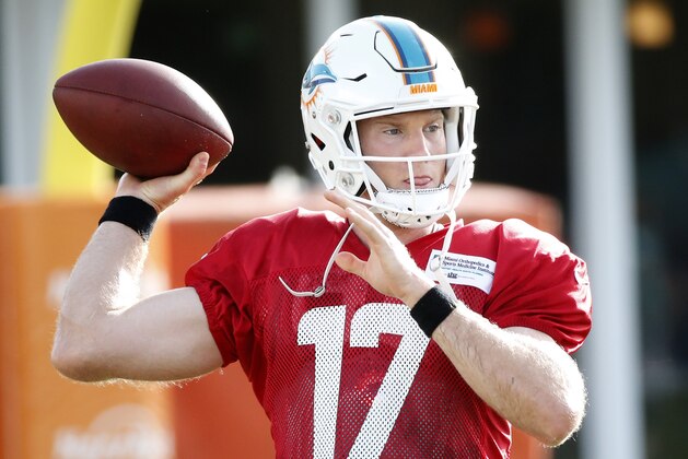 Miami Dolphins quarterback Ryan Tannehill passes the ball during an NFL football training camp, Thursday, Aug. 3, 2017 at the Dolphins training facility in Davie, Fla. (AP Photo/Wilfredo Lee)