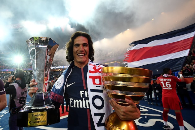 TOPSHOT - Paris Saint-Germain's Uruguayan forward Edinson Cavani celebrates after winning the French L1 title at the end of the French L1 football match Paris Saint-Germain (PSG) vs Rennes on May 12, 2018 at the Parc des Princes stadium in Paris. (Photo by FRANCK FIFE / AFP)        (Photo credit should read FRANCK FIFE/AFP/Getty Images)