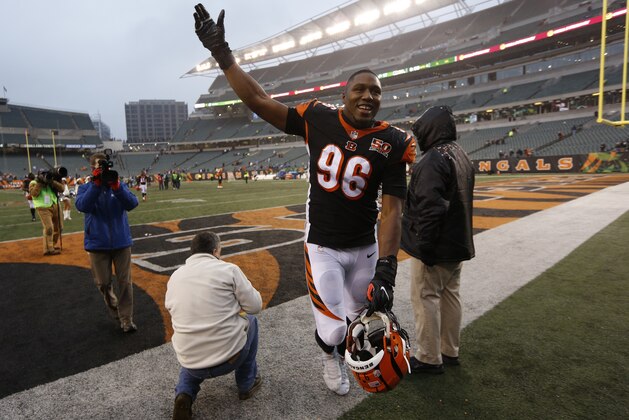 Cincinnati Bengals defensive end Carlos Dunlap (96) walks off the field after an NFL football game against the Detroit Lions, Sunday, Dec. 24, 2017, in Cincinnati. (AP Photo/Frank Victores)