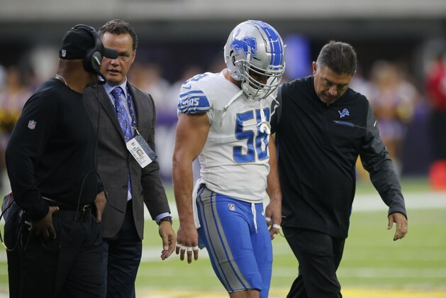 Detroit Lions middle linebacker Paul Worrilow (58) is helped off the field after getting injured during the first half of an NFL football game against the Minnesota Vikings, Sunday, Oct. 1, 2017, in Minneapolis. (AP Photo/Jim Mone)