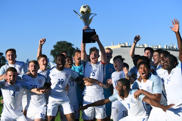 England's players celebrate with the trophy after winning the Under 21 international football final match England vs Ivory Coast, at the De Lattre Stadium in Aubagne, southern France on June 10, 2017, as part of the 45th Toulon Tournament ' Festival international Espoirs '.  / AFP PHOTO / ANNE-CHRISTINE POUJOULAT        (Photo credit should read ANNE-CHRISTINE POUJOULAT/AFP/Getty Images)