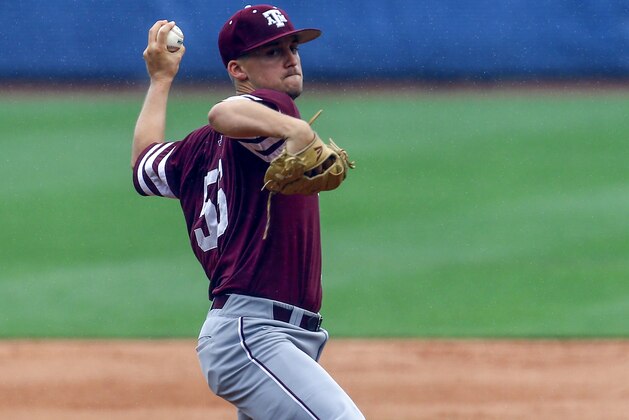 Texas A&M pitcher Kaylor Chafin (56) throws a pitch during the first inning of the Southeastern Conference NCAA college baseball tournament against Vanderbilt, Tuesday, May 22, 2018, in Hoover, Ala. (AP Photo/Butch Dill)