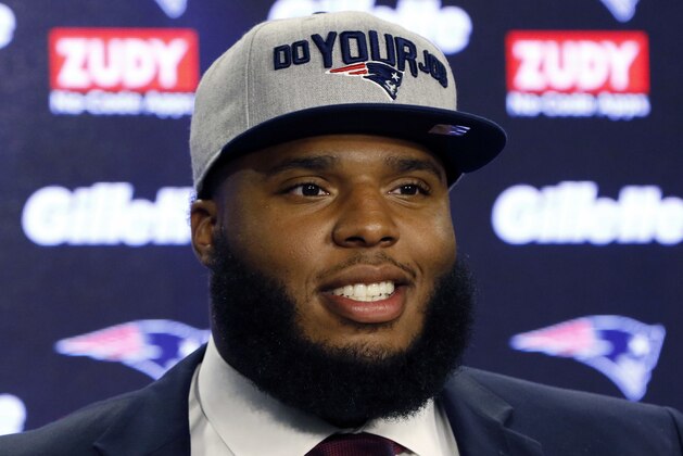 New England Patriots first-round NFL draft pick offensive lineman Isaiah Wynn, out of the University of Georgia, speaks to the media, Friday, April 27, 2018, in Foxborough, Mass. (AP Photo/Bill Sikes)