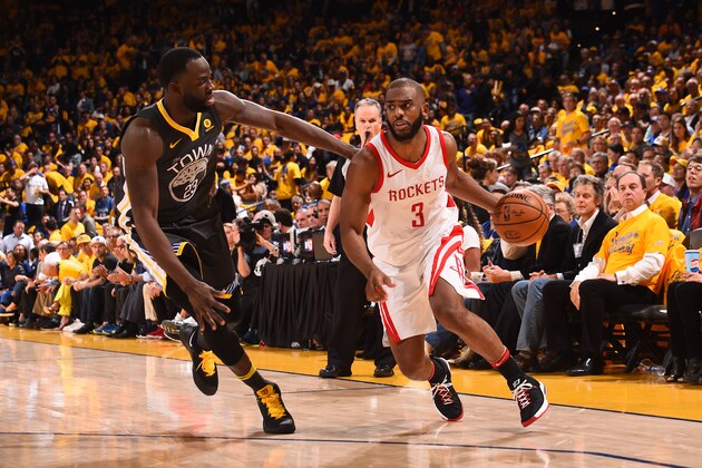OAKLAND, CA - MAY 22:  Chris Paul #3 of the Houston Rockets handles the ball against the Golden State Warriors in Game Four of the Western Conference Finals of the 2018 NBA Playoffs on May 22, 2018 at ORACLE Arena in Oakland, California. NOTE TO USER: User expressly acknowledges and agrees that, by downloading and or using this photograph, user is consenting to the terms and conditions of Getty Images License Agreement. Mandatory Copyright Notice: Copyright 2018 NBAE (Photo by Noah Graham/NBAE via Getty Images)