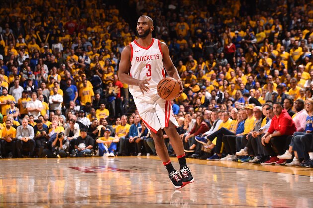 OAKLAND, CA - MAY 22:  Chris Paul #3 of the Houston Rockets handles the ball against the Golden State Warriors in Game Four of the Western Conference Finals of the 2018 NBA Playoffs on May 22, 2018 at ORACLE Arena in Oakland, California. NOTE TO USER: User expressly acknowledges and agrees that, by downloading and or using this photograph, user is consenting to the terms and conditions of Getty Images License Agreement. Mandatory Copyright Notice: Copyright 2018 NBAE (Photo by Noah Graham/NBAE via Getty Images)