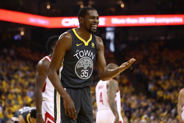OAKLAND, CA - MAY 22:  Kevin Durant #35 of the Golden State Warriors reacts to a play against the Houston Rockets during Game Four of the Western Conference Finals of the 2018 NBA Playoffs at ORACLE Arena on May 22, 2018 in Oakland, California. NOTE TO USER: User expressly acknowledges and agrees that, by downloading and or using this photograph, User is consenting to the terms and conditions of the Getty Images License Agreement.  (Photo by Ezra Shaw/Getty Images)