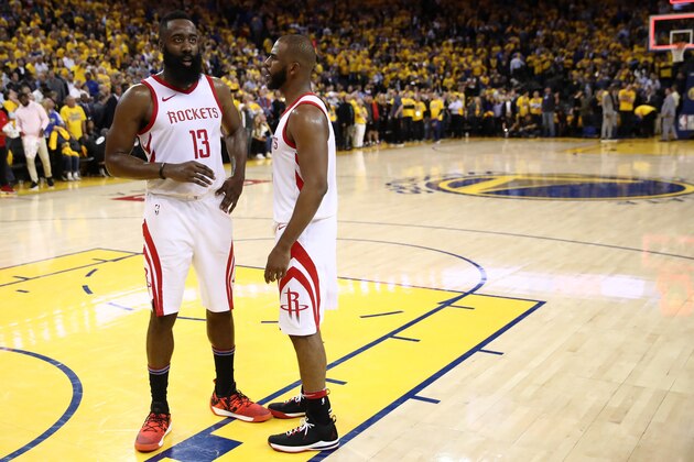 OAKLAND, CA - MAY 22:  James Harden #13 and Chris Paul #3 of the Houston Rockets stand on the court as the officials review a play at the end of Game Four of the Western Conference Finals of the 2018 NBA Playoffs at ORACLE Arena on May 22, 2018 in Oakland, California. NOTE TO USER: User expressly acknowledges and agrees that, by downloading and or using this photograph, User is consenting to the terms and conditions of the Getty Images License Agreement.  (Photo by Ezra Shaw/Getty Images)
