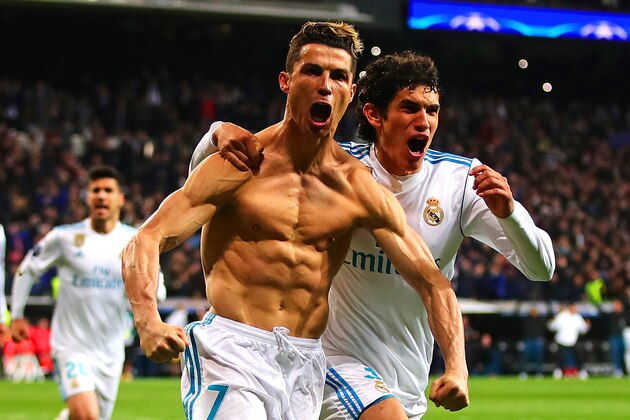 MADRID, SPAIN - APRIL 11: Cristiano Ronaldo of Real Madrid celebrates scoring his side's first goal during the UEFA Champions League Quarter Final, second leg match between Real Madrid and Juventus at Estadio Santiago Bernabeu on April 11, 2018 in Madrid, Spain. (Photo by Chris Brunskill Ltd/Getty Images)