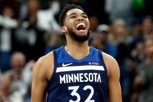 Minnesota Timberwolves' Karl-anthony Towns plays against the Houston Rockets in the first half during Game 3 of an NBA basketball first round playoff series Saturday, April 21, 2018, in Minneapolis. (AP Photo/Jim Mone)