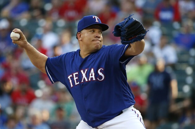 ARLINGTON, TX - MAY 21: Bartolo Colon #40 of the Texas Rangers delivers against the New York Yankees during the first inning at Globe Life Park  on May 21, 2018 in Arlington, Texas. (Photo by Ron Jenkins/Getty Images)