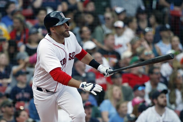 Boston Red Sox's J.D. Martinez watches his two-run home run during the fifth inning of a baseball game against the Baltimore Orioles in Boston, Sunday, May 20, 2018. (AP Photo/Michael Dwyer)