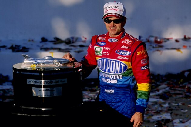 14 Feb 1999:   Jeff Gordon #24 stands with his trophy after winning the Daytona 500  at the Daytona International Speedway in Daytona, Florida. Mandatory Credit: Jamie Squire  /Allsport