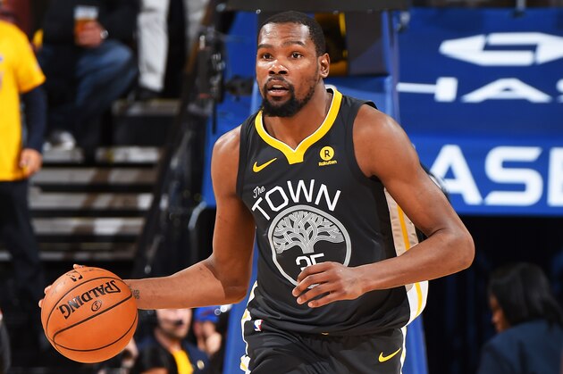 OAKLAND, CA - MAY 22: Kevin Durant #35 of the Golden State Warriors dribbles the ball up court during Game Four of the Western Conference Finals during the 2018 NBA Playoffs on May 20, 2018 at ORACLE Arena in Oakland, California. NOTE TO USER: User expressly acknowledges and agrees that, by downloading and/or using this Photograph, user is consenting to the terms and conditions of the Getty Images License Agreement. Mandatory Copyright Notice: Copyright 2018 NBAE (Photo by Andrew D. Bernstein/NBAE via Getty Images)