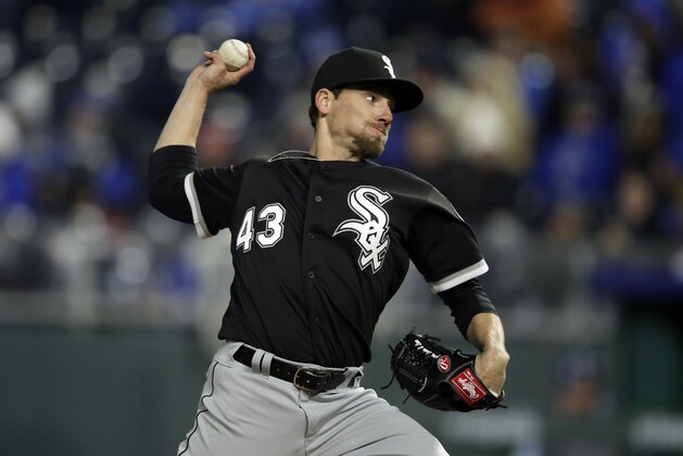 Chicago White Sox relief pitcher Danny Farquhar during a baseball game against the Kansas City Royals at Kauffman Stadium in Kansas City, Mo., Saturday, March 31, 2018. (AP Photo/Orlin Wagner)