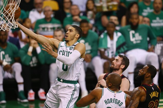 BOSTON, MA - MAY 23:  Jayson Tatum #0 of the Boston Celtics drives to the basket in the first half against the Cleveland Cavaliers during Game Five of the 2018 NBA Eastern Conference Finals at TD Garden on May 23, 2018 in Boston, Massachusetts. NOTE TO USER: User expressly acknowledges and agrees that, by downloading and or using this photograph, User is consenting to the terms and conditions of the Getty Images License Agreement.  (Photo by Adam Glanzman/Getty Images)