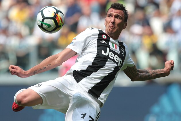 TURIN, ITALY - MAY 19:  Mario Mandzukic of Juventus FC kicks the ball during the serie A match between Juventus and Hellas Verona FC at Allianz Stadium on May 19, 2018 in Turin, Italy.  (Photo by Emilio Andreoli/Getty Images)