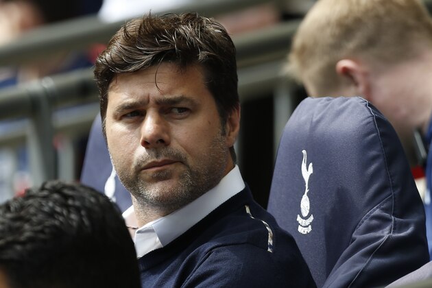 Tottenham Hotspur's Argentinian head coach Mauricio Pochettino awaits kick off in the English Premier League football match between Tottenham Hotspur and Leicester City at Wembley Stadium in London, on May 13, 2018. (Photo by Ian KINGTON / AFP) / RESTRICTED TO EDITORIAL USE. No use with unauthorized audio, video, data, fixture lists, club/league logos or 'live' services. Online in-match use limited to 75 images, no video emulation. No use in betting, games or single club/league/player publications. /         (Photo credit should read IAN KINGTON/AFP/Getty Images)
