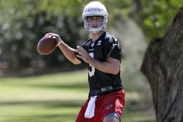 Arizona Cardinals' first-round draft pick Josh Rosen runs drills during NFL football rookie camp Friday, May 11, 2018, in Tempe, Ariz. (AP Photo/Matt York)