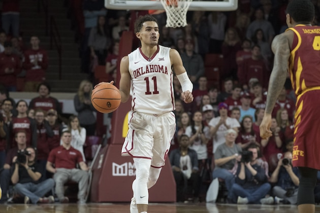 NORMAN, OK - MARCH 2:  Oklahoma Sooners guard Trae Young #11 brings the ball up court against Iowa State during the second half of a NCAA college basketball game at the Lloyd Noble Center on March 2, 2018 in Norman, Oklahoma. (Photo by J Pat Carter/Getty Images)