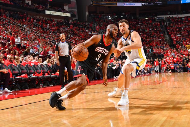 HOUSTON, TX - MAY 24: Chris Paul #3 of the Houston Rockets handles the ball against the Golden State Warriors during Game Five of the Western Conference Finals of the 2018 NBA Playoffs on May 24, 2018 at the Toyota Center in Houston, Texas. NOTE TO USER: User expressly acknowledges and agrees that, by downloading and or using this photograph, User is consenting to the terms and conditions of the Getty Images License Agreement. Mandatory Copyright Notice: Copyright 2018 NBAE (Photo by Jesse D. Garrabrant/NBAE via Getty Images)