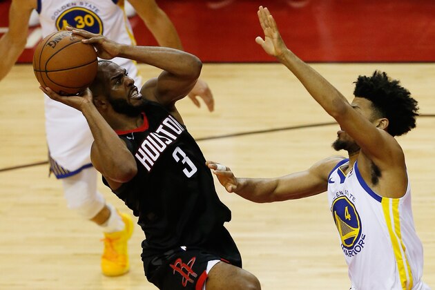 HOUSTON, TX - MAY 24:  Chris Paul #3 of the Houston Rockets goes up against Quinn Cook #4 of the Golden State Warriors in the fourth quarter of Game Five of the Western Conference Finals of the 2018 NBA Playoffs at Toyota Center on May 24, 2018 in Houston, Texas.  (Photo by Bob Levey/Getty Images)