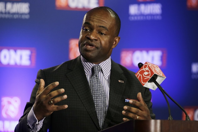 FILE - In this Jan. 29, 2015, file photo, NFL Players Association Executive Director DeMaurice Smith speaks during a news conference for NFL Super Bowl XLIX football game, in Phoenix.  Leaders from the NFL and NHL players associations have contributed to unveiling a universal declaration of player rights. Among the 17 articles laid out in the declaration are rights to unionize and collectively bargain, express opinions freely and receive equal pay for equal work. The declaration was made by the World Players Association on Thursday, Dec. 14, 2017. (AP Photo/David J. Phillip, File)