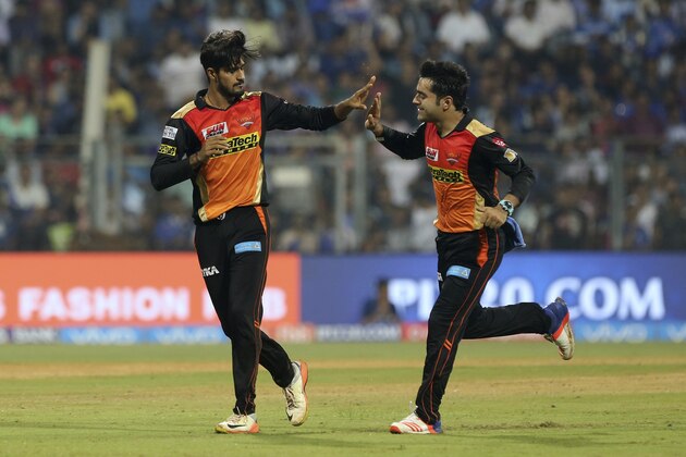 Sunrisers Hyderabads Deepak Hooda, left with Rashid Khan celebrates after Parthiv Patel's wicket during their Indian Premier League (IPL) cricket match against Mumbai Indians in Mumbai, India, Wednesday, April 12, 2017.(AP Photo/Rajanish Kakade)