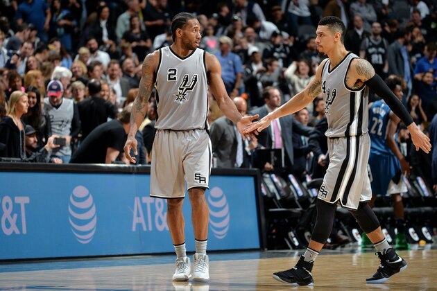 SAN ANTONIO, TX - MARCH 4: Kawhi Leonard #2 and Danny Green #14 of the San Antonio Spurs high five each other during the game against the Minnesota Timberwolves on March 4, 2017 at the AT&T Center in San Antonio, Texas. NOTE TO USER: User expressly acknowledges and agrees that, by downloading and or using this photograph, user is consenting to the terms and conditions of the Getty Images License Agreement. Mandatory Copyright Notice: Copyright 2017 NBAE (Photos by Mark Sobhani/NBAE via Getty Images)