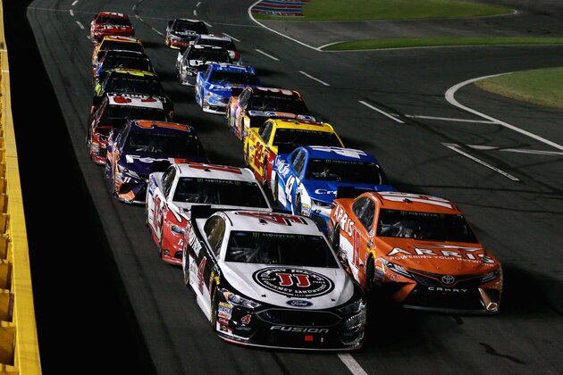 CHARLOTTE, NORTH CAROLINA - MAY 19:  Kevin Harvick, driver of the #4 Jimmy John's Ford, and Daniel Suarez, driver of the #19 ARRIS Toyota, lead the field during the Monster Energy NASCAR Cup Series All-Star Race at Charlotte Motor Speedway on May 19, 2018 in Charlotte, North Carolina.  (Photo by Sean Gardner/Getty Images)