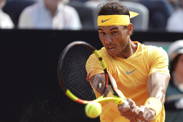 Spain's Rafael Nadal returns the ball to Germany's Alexander Zverev during their final match at the Italian Open tennis tournament in Rome, Sunday, May 20, 2018. (AP Photo/Gregorio Borgia)