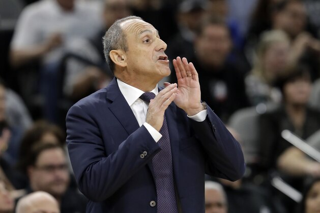 San Antonio Spurs assistant coach Ettore Messina shouts to the team during the first half of Game 3 of a first-round NBA basketball playoff series against the Golden State Warriors in San Antonio, Thursday, April 19, 2018. (AP Photo/Eric Gay)