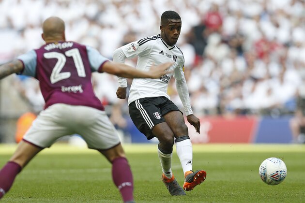Fulham's English defender Ryan Sessegnon (R) makes a through pass in the build up to the opening goal by Fulham's English midfielder Tom Cairney during the English Championship play-off final football match between Aston Villa and Fulham at Wembley Stadium in London on May 26, 2018. (Photo by Ian KINGTON / AFP) / NOT FOR MARKETING OR ADVERTISING USE / RESTRICTED TO EDITORIAL USE        (Photo credit should read IAN KINGTON/AFP/Getty Images)
