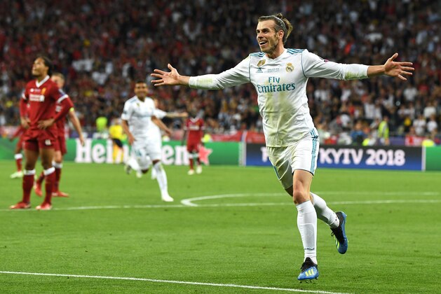 KIEV, UKRAINE - MAY 26:  Gareth Bale of Real Madrid celebrates scoring his sides third goal, his second, during the UEFA Champions League Final between Real Madrid and Liverpool at NSC Olimpiyskiy Stadium on May 26, 2018 in Kiev, Ukraine.  (Photo by David Ramos/Getty Images)
