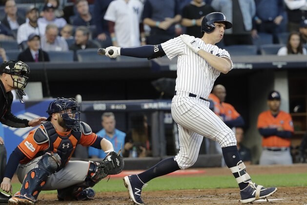 New York Yankees' Greg Bird hits an RBI singe during the second inning of Game 5 of baseball's American League Championship Series against the Houston Astros Wednesday, Oct. 18, 2017, in New York. (AP Photo/David J. Phillip)