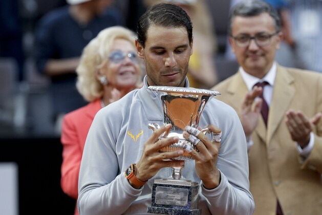 Spain's Rafael Nadal holds the trophy after beating Germany's Alexander Zverev in the final match of the Italian Open tennis tournament, in Rome, Sunday, May 20, 2018. Nadal won 6-1, 1-6, 6-3. (AP Photo/Gregorio Borgia) Spain's Rafael Nadal holds the trophy after beating Germany's Alexander Zverev in the final match of the Italian Open tennis tournament, in Rome, Sunday, May 20, 2018. Nadal won 6-1, 1-6, 6-3. (AP Photo/Gregorio Borgia)