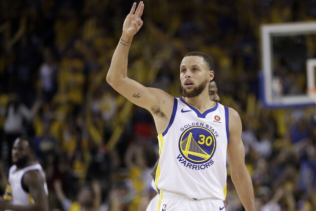 Golden State Warriors guard Stephen Curry (30) gestures during the second half of Game 6 of the NBA basketball Western Conference Finals against the Houston Rockets in Oakland, Calif., Saturday, May 26, 2018. The Warriors won 115-86. (AP Photo/Marcio Jose Sanchez)
