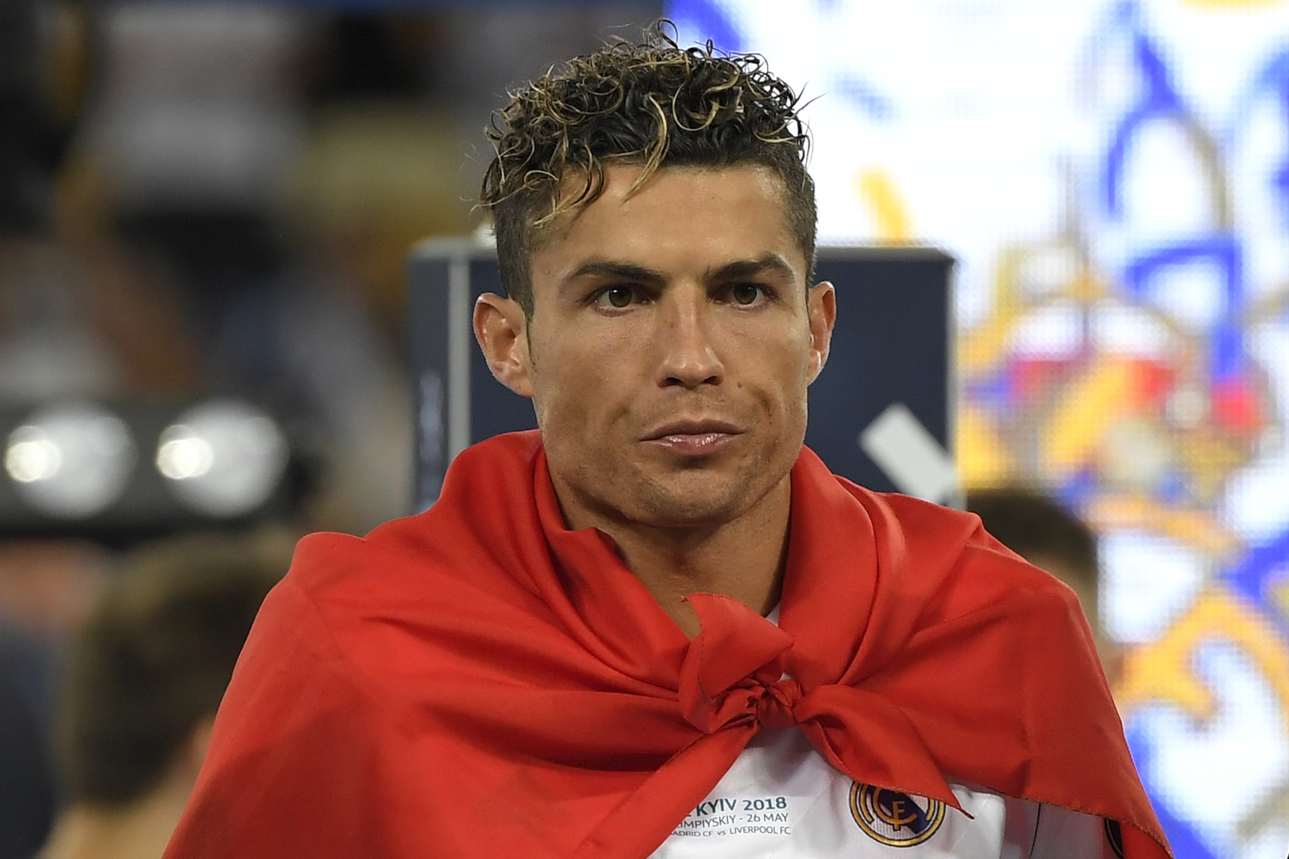 Real Madrid's Portuguese forward Cristiano Ronaldo celebrates after winning the UEFA Champions League final football match between Liverpool and Real Madrid at the Olympic Stadium in Kiev, Ukraine on May 26, 2018. - Real Madrid defeated Liverpool 3-1. (Photo by LLUIS GENE / AFP)        (Photo credit should read LLUIS GENE/AFP/Getty Images)