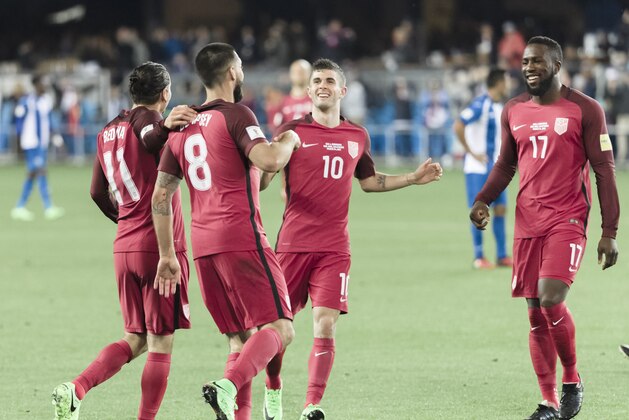 SAN JOSE, CA - MARCH 24:  Christian Pulisic #10, Jozy Altidore #17, and Alejandro Bedoya congratulate Clint Dempsey #8 of the United States after Dempsey scored his third goal of the FIFA 2018 World Cup Qualifier match between the United States and Honduras on March 24, 2017 at Avaya Stadium in San Jose, California.  (Photo by David Madison/Getty Images)