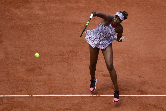 PARIS, FRANCE - MAY 27:  Venus Williams of USA serves during her ladies singles first round match against Qiang Wang of China during day one of the 2018 French Open at Roland Garros on May 27, 2018 in Paris, France.  (Photo by XIN LI/Getty Images)