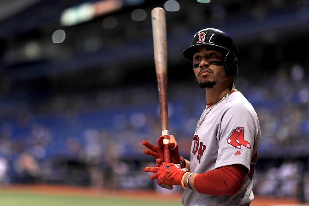 ST PETERSBURG, FL - MAY 22: Mookie Betts #50 of the Boston Red Sox looks on during a game against the Tampa Bay Rays at Tropicana Field on May 22, 2018 in St Petersburg, Florida.  (Photo by Mike Ehrmann/Getty Images)