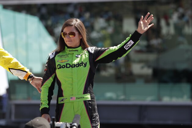 Danica Patrick waves as she's introduced before the start of the Indianapolis 500 auto race at Indianapolis Motor Speedway, in Indianapolis Sunday, May 27, 2018. (AP Photo/Michael Conroy)