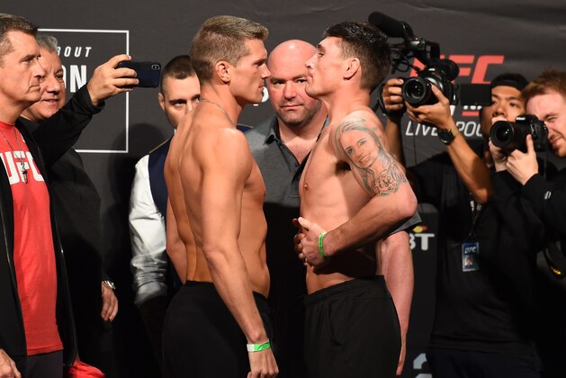 LIVERPOOL, ENGLAND - MAY 26:  (L-R) Opponents Stephen Thompson and Darren Till of England face off during the UFC Weigh-in at ECHO Arena on May 26, 2018 in Liverpool, England. (Photo by Josh Hedges/Zuffa LLC/Zuffa LLC via Getty Images)