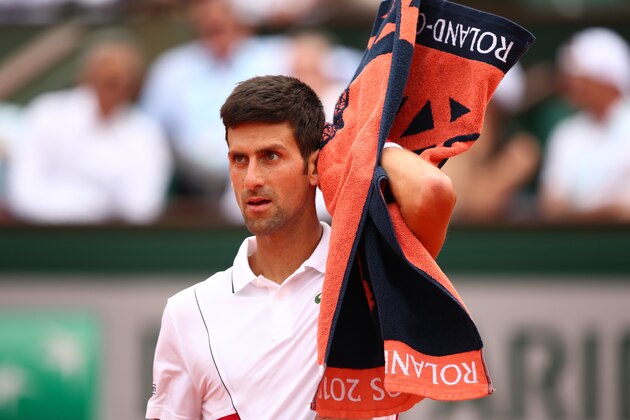 PARIS, FRANCE - MAY 28:  Novak Djokovic of Serbia reacts during the mens singles first round match against Rogerio Dutra Silva of Brazil during day two of the 2018 French Open at Roland Garros on May 28, 2018 in Paris, France.  (Photo by Clive Brunskill/Getty Images)
