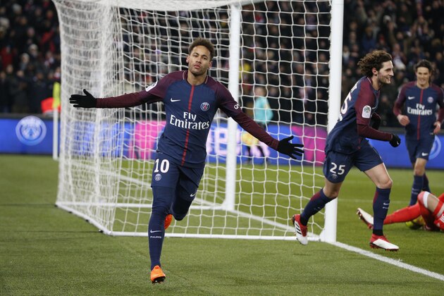 Paris Saint-Germain's Brazilian forward Neymar Jr celebrates after Marseille's Portuguese defender Rolando (unseen) scored an own goal after a kick of Neymar during the French L1 football match between Paris Saint-Germain (PSG) and Marseille (OM) at the Parc des Princes in Paris on February 25, 2018.  / AFP PHOTO / GEOFFROY VAN DER HASSELT        (Photo credit should read GEOFFROY VAN DER HASSELT/AFP/Getty Images)