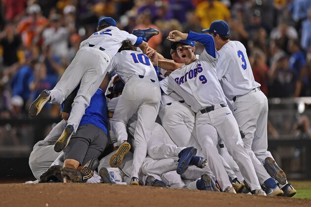 OMAHA, NE - JUNE 27:  Players of the Florida Gators celebrate after defeating the LSU Tigers 6-1 to win the National Championship at the College World Series on June 27, 2017 at TD Ameritrade Park in Omaha, Nebraska.  (Photo by Peter Aiken/Getty Images)