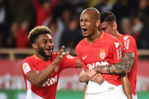 Monaco's Brazilian defender Fabinho (2R) jubilates after scoring, during the French L1 football match Monaco (ASM) vs St Etienne (ASSE)  on May 12, 2018 at the Louis II Stadium in Monaco. (Photo by Boris HORVAT / AFP)        (Photo credit should read BORIS HORVAT/AFP/Getty Images)